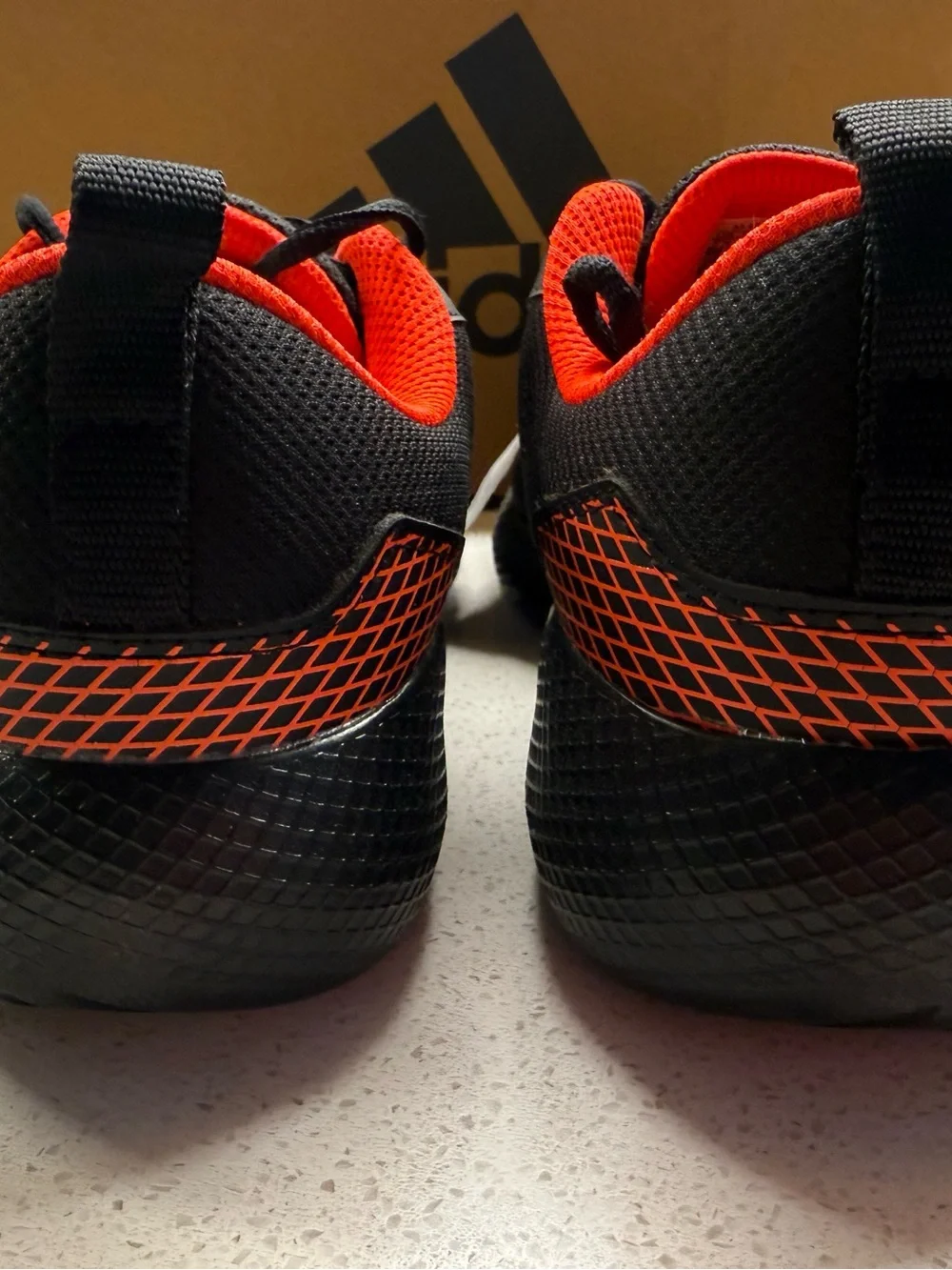 adidas Men’s Athletic Sneakers in Black with Red Accents Mens 7.5 Womens 9